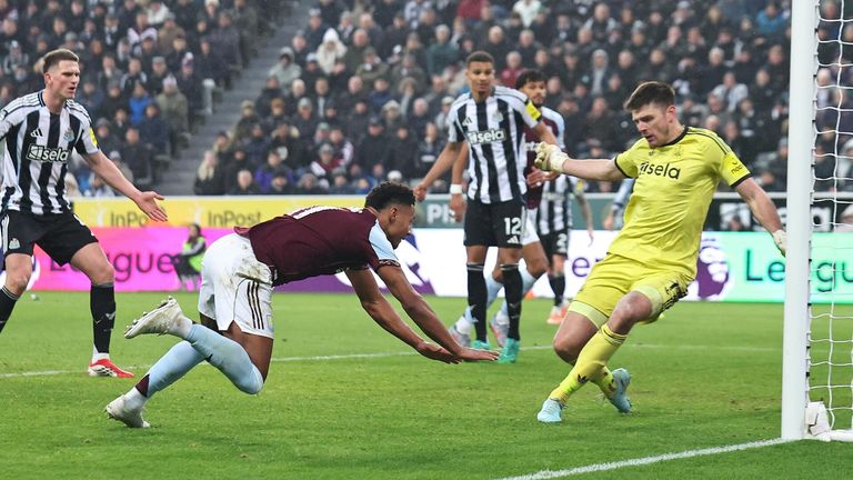 Ollie Watkins stoops to score Aston Villa's second goal at Newcastle