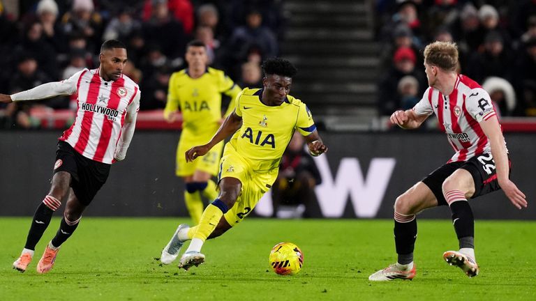 Mohammed Kudus dribbles between Rico Henry and Nathan Collins