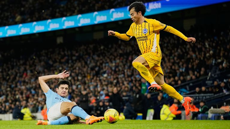 Abdukodir Khusanov makes a sliding challenge on Kaoru Mitoma 