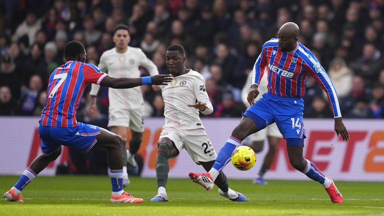 Moises Caicedo and Jean-Philippe Mateta battle for the ball