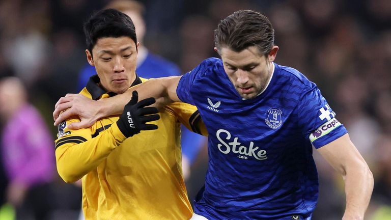 James Tarkowski is challenged by Hee-Chan Hwang
