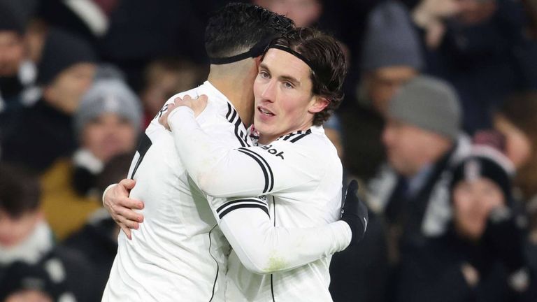 Goalscorers Harry Wilson and Raul Jiminez celebrate at Craven Cottage
