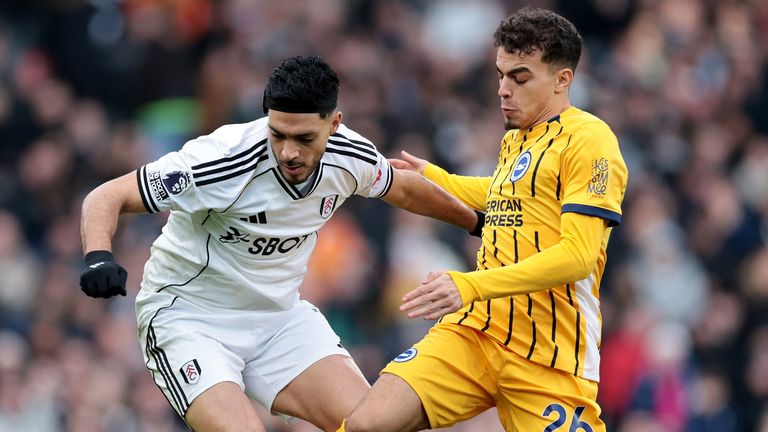 Raul Jimenez and Yasin Ayari battle for the ball