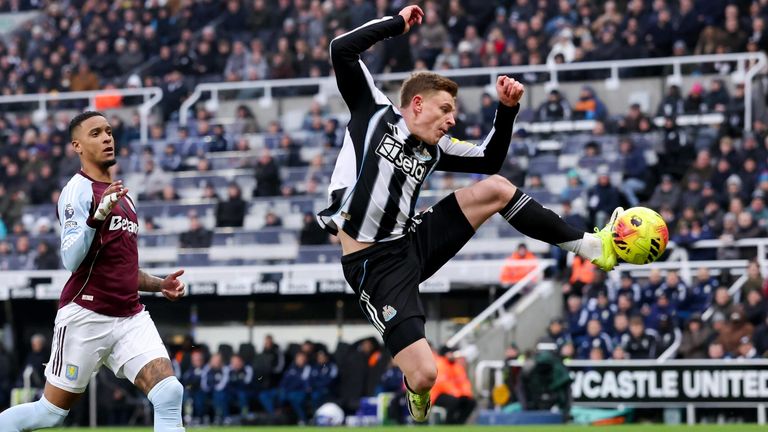 Harvey Barnes leaps to control the ball at St James' Park