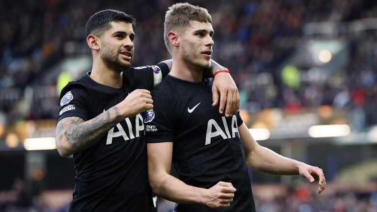 Micky van de Ven celebrates with team-mate Cristian Romero after giving Spurs the lead at Turf Moor