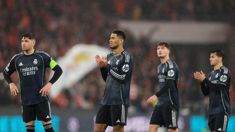 Jude Bellingham leads a group of players applauding Real Madrid fans after defeat to Benfica.
Patricia de Melo Moreira/AFP via Getty Images