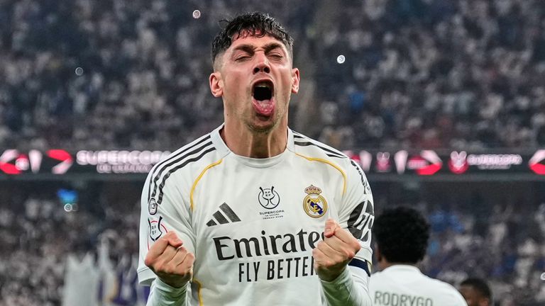 Real Madrid's Federico Valverde, foreground, celebrates after scoring the opening goal during the Spanish Super Cup semifinal 