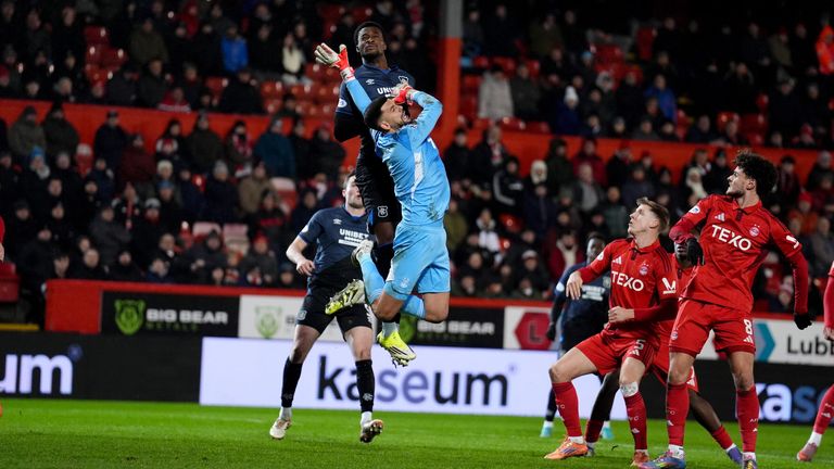 Emmanuel Fernandez rises above Dimitar Mitov and heads the ball into the net, but his effort is ruled out by VAR