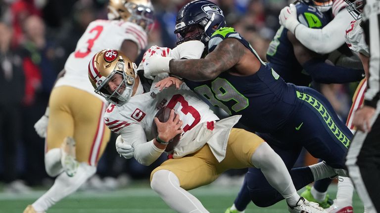 Seattle Seahawks' Leonard Williams sacks San Francisco 49ers quarterback Brock Purdy (AP Photo/Lindsey Wasson)