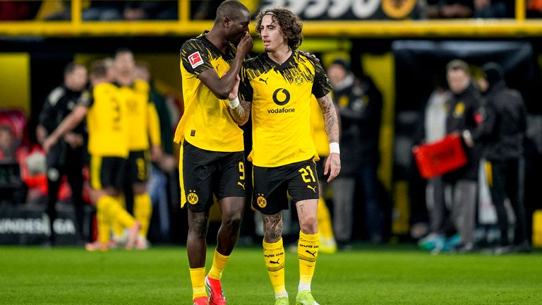 Fabio Silva talking to Serhou Guirassy on the pitch during Borussia Dortmund's win over Werder Bremen