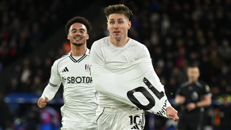 Tom Cairney takes off his shirt as he celebrates scoring Fulham's equaliser against Crystal Palace