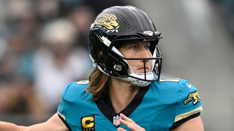 Jacksonville Jaguars quarterback Trevor Lawrence (16) looks to throw a pass during the first half of an NFL football game against the Tennessee Titans, Sunday, Jan. 4, 2026, in Jacksonville, Fla. (AP Photo/Phelan M. Ebenhack)