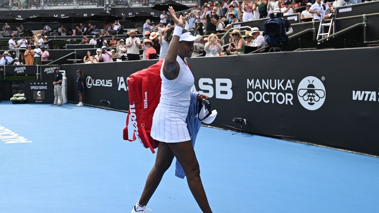 Venus Williams of the U.S. waves as she walks off court following her match against Magda Linette of Poland at the ASB Classic Women's Tenni