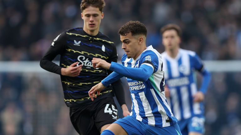 Yasin Ayari of Brighton runs with the ball while under pressure from Harrison Armstrong of Everton