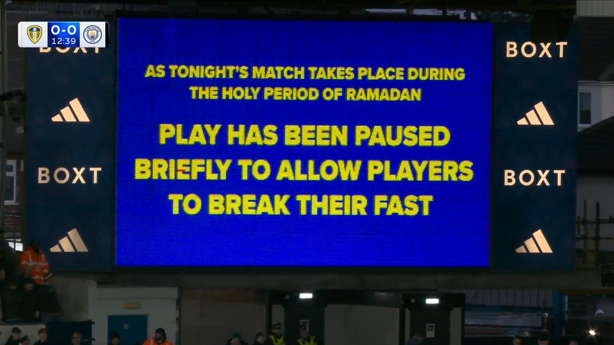 Leeds United vs Manchester City match at Elland Road with Ramadan break message displayed on stadium screen