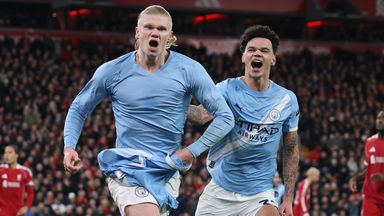 Erling Haaland celebrates after scoring the penalty to give Manchester City their 2-1 lead at Liverpool