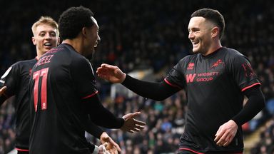 Macaulay Langstaff of Millwall celebrates scoring his team's second goal of the game with teammates