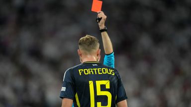 Scotland's Ryan Porteous is shown a red card by referee Clement Turpin after a challenge on Germany's Ilkay Gundogan during a Group A match between Germany and Scotland at the Euro 2024 soccer tournament in Munich, Germany, Friday, June 14, 2024. (AP Photo/Matthias Schroeder)