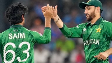 Pakistan's Saim Ayub, left, and captain Salman Ali Agha celebrate the wicket of India's Ishan Kishan during the T20 World Cup cricket match between India and Pakistan, Sunday, Feb. 15, 2026, in Colombo, Sri Lanka. (AP Photo/Eranga Jayawardene)