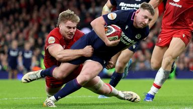 Finn Russell scores a try for Scotland against Wales