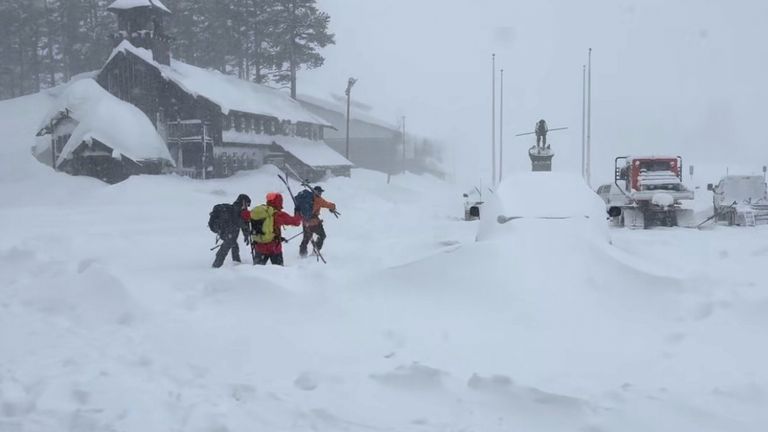 Members of a rescue team in Soda Springs. Pic: Nevada County Sheriff's Office via AP