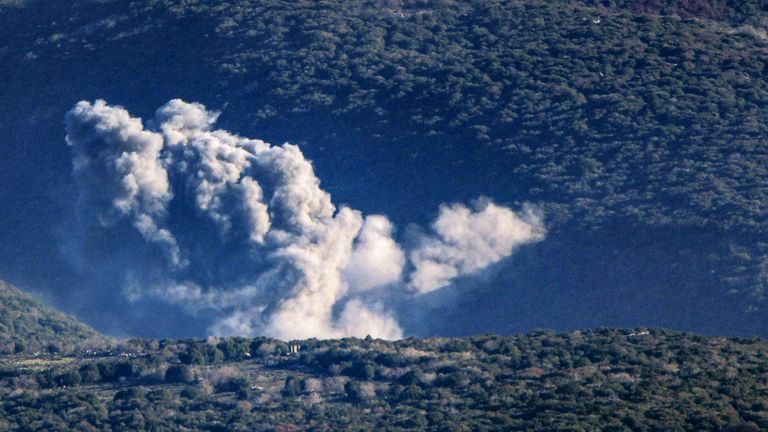 Smoke rises from alleged pro-Iranian Hezbollah areas in the southern Lebanese village of Katrani. Pic: AP