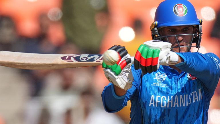 Afghanistan's Azmatullah Omarzai plays a shot during the T20 World Cup cricket match between Afghanistan and South Africa in Ahmedabad, India, Wednesday, Feb. 11, 2026. (AP Photo/Ajit Solanki)