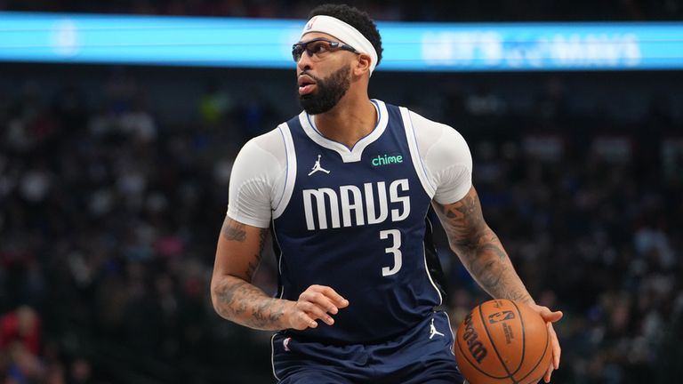 Dallas Mavericks forward Anthony Davis (3) works the floor during an NBA basketball game between the Dallas Mavericks and the Philadelphia 76ers Thursday, Jan. 1, 2026, in Dallas. (AP Photo/Julio Cortez)