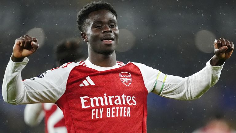 Bukayo Saka celebrates giving Arsenal an early lead at Wolves