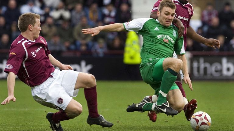 Chris Hogg in the thick of the action for Hibs in the Edinburgh derby against Hearts