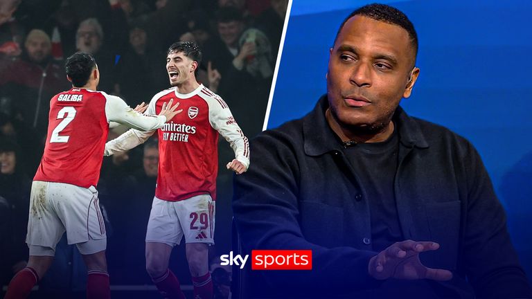 Arsenal's Kai Havertz, right, celebrates with Arsenal's William Saliba after scoring the opening goal during the English League Cup semifinal second leg soccer match between Arsenal and Chelsea in London, Tuesday, Feb. 3, 2026.