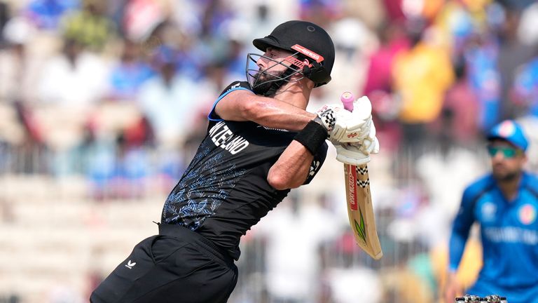 New Zealand's Daryl Mitchell plays a shot during the T20 World Cup cricket match between Afghanistan and New Zealand in Chennai, India, Sunday, Feb. 8, 2026. (AP Photo/Mahesh Kumar A.)