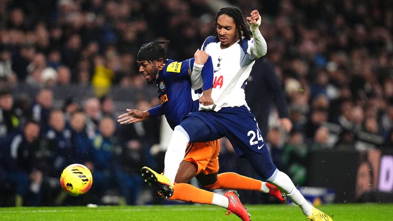 Tottenham Hotspur's Djed Spence (right) and Newcastle's Anthony Elanga compete for possession