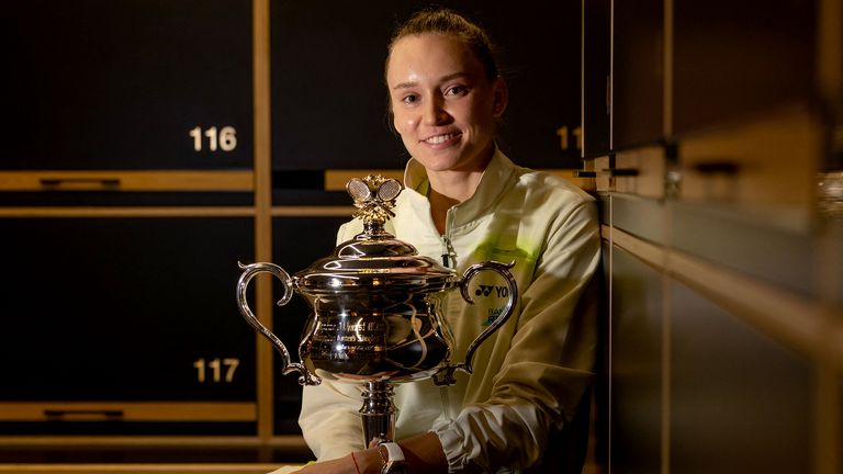 This handout picture released by Tennis Australia on February 1, 2026, shows Kazakhstan's Elena Rybakina poses with the 2026 Australian Open