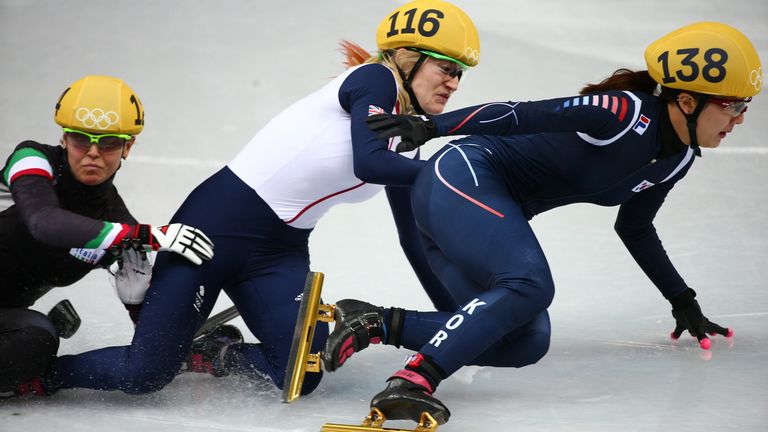  Arianna Fontana of Italy, Elise Christie of Great Britain, Park Seung-Hi of South Korea fall during the Women's 500m final at the 2014 Game