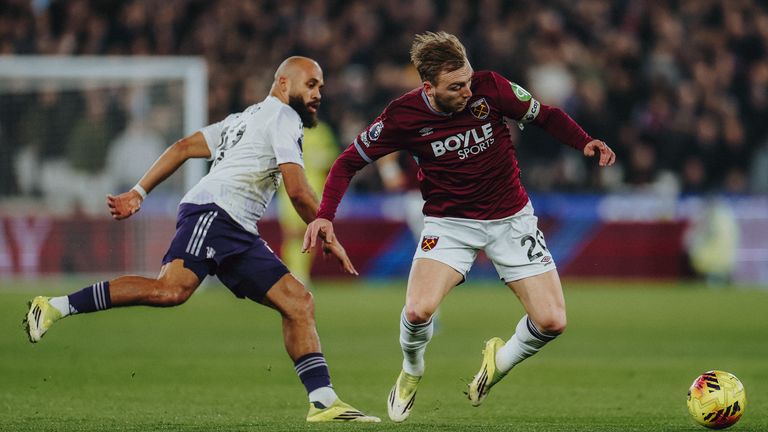 Jarrod Bowen of West Ham is challenged by Manchester United's Bryan Mbeumo