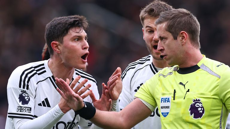 Fulham defender Jorge Cuenca remonstrates with referee John Brooks after Man Utd are awarded a penalty 