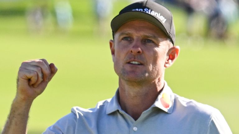 Justin Rose, of England, celebrates on the 18th green after winning the Farmers Insurance Open golf tournament Sunday, Feb. 1, 2026, at Torrey Pines in San Diego. (AP Photo/Denis Poroy)