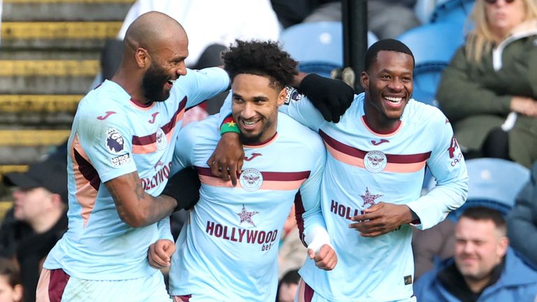 Brentford's Kevin Schade (centre) celebrates after making it 3-0