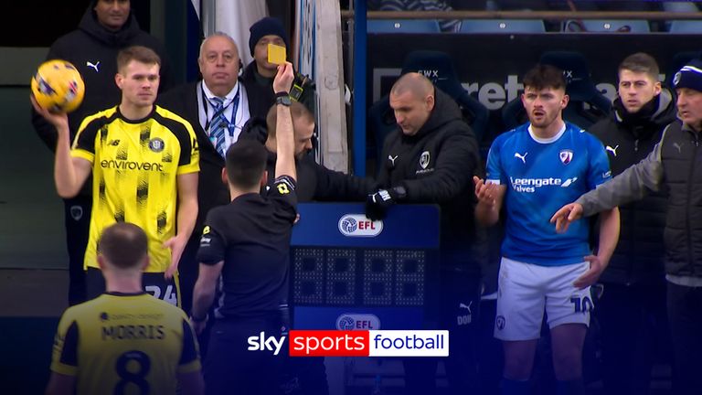 Lee Bonis is shown a second yellow for kicking the ball away while waiting to come back on the pitch after an injury!