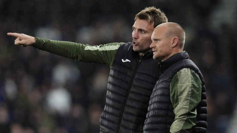 Chris Hogg and Liam Manning in discussions during their time together at Norwich City