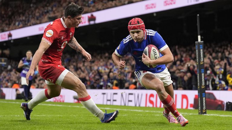 France's Louis Bielle-Biarrey on the way to scoring his sides second try of the game