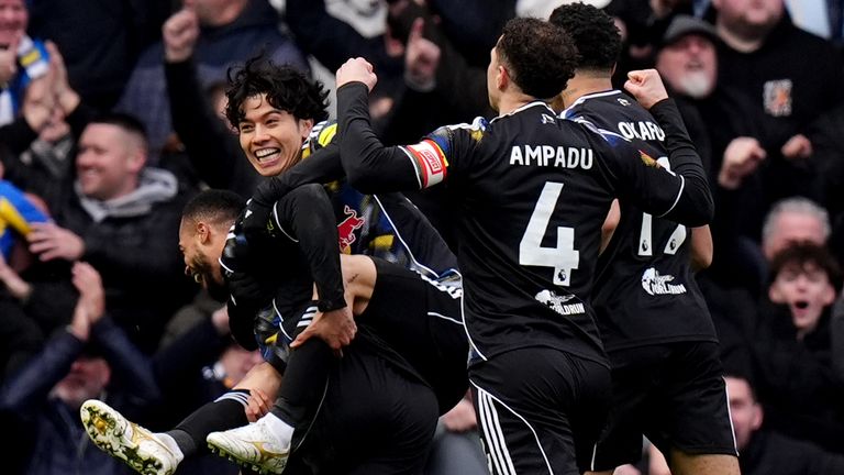 Leeds United's Lukas Nmecha (left) celebrates with Ao Tanaka (second left) after scoring his sides first goal