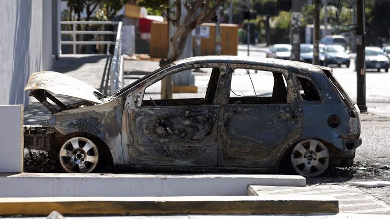 A burned car outside a store, a day after violent clashes in Guadalajara last weekend.
Ulises Ruiz / AFP via Getty Images