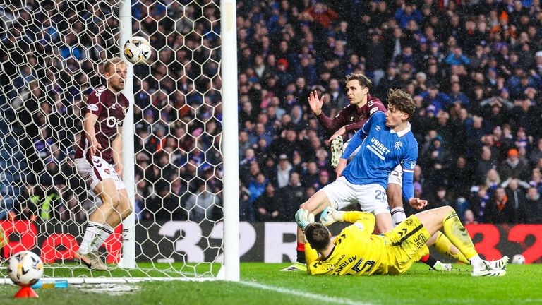 Hearts' Michael Steinwender (centre) puts the ball into his own net to make it 1-1