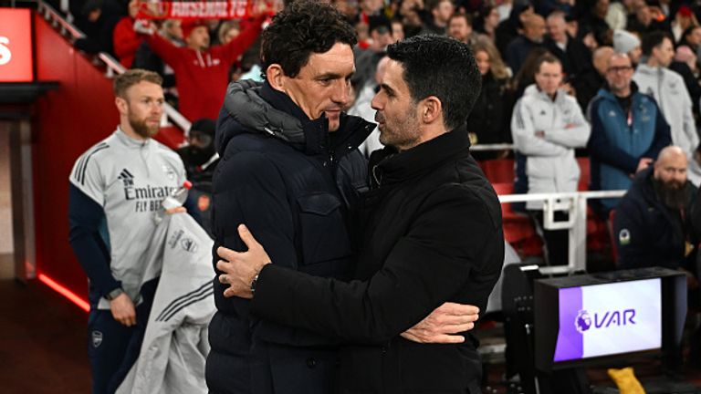 LONDON, ENGLAND - DECEMBER 03: Keith Andrews, Manager of Brentford, (L) and Mikel Arteta, Manager of Arsenal (R), embrace prior to the Premier League match between Arsenal and Brentford at Emirates Stadium on December 03, 2025 in London, England. (Photo by David Price/Arsenal FC via Getty Images)