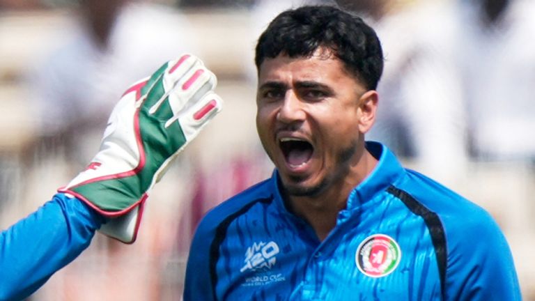 Afghanistan's Mujeeb Ur Rahman celebrates a wicket during the 2026 Men's T20 World Cup (Associated Press)