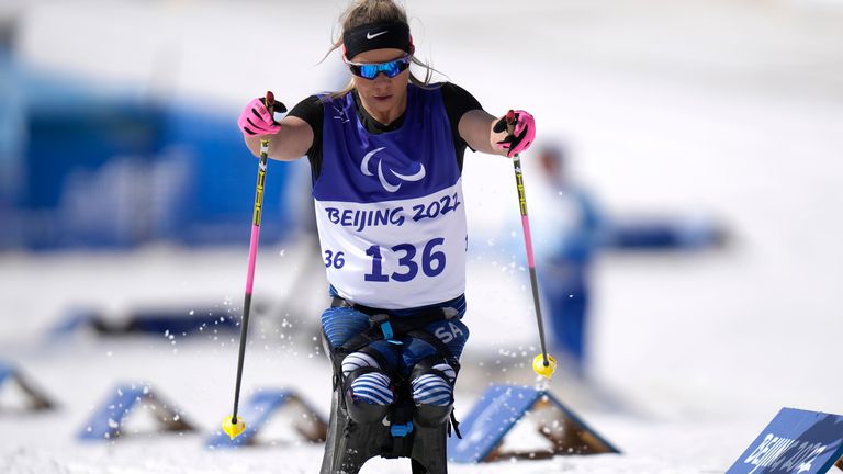 Oksana Masters during the women's middle distance sitting event of para cross country skiing at the 2022 Winter Paralympics (AP Photo/Shuji)