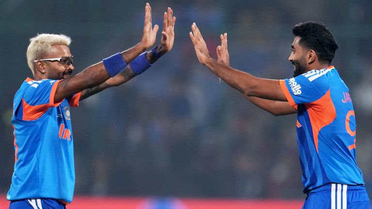  Pandya and Bumrah celebrate the wicket of Ruben Trumpelmann