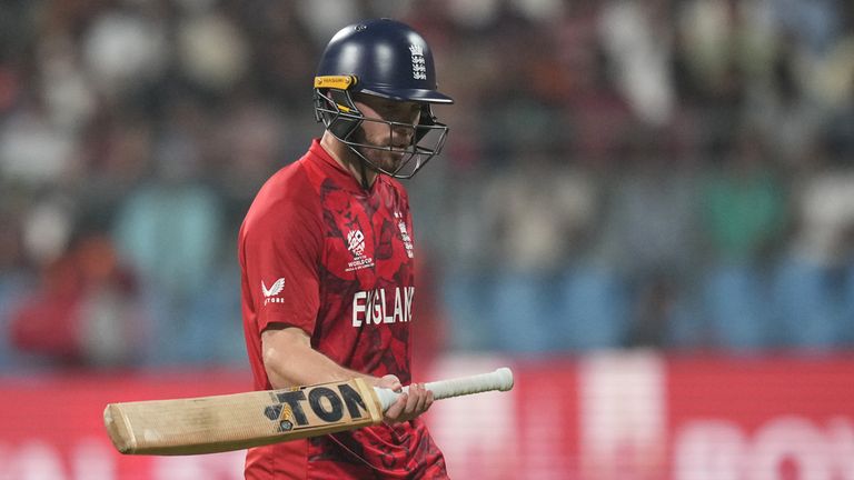 England's Phil Salt leaves the ground after losing his wicket during the T20 World Cup cricket match between England and West Indies in Mumbai, India, Wednesday, Feb. 11, 2026. (AP Photo/Rafiq Maqbool)